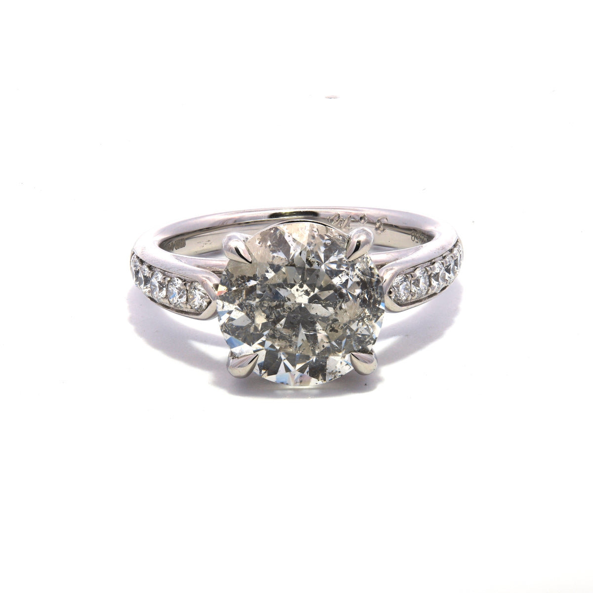 Round Brilliant Engagement RIng in 4.11 cts with Channel Setting on the Shoulders in Platinum 950