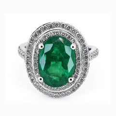 3.95ct Oval cut Green Emerald with Diamond Halo in Platinum 950